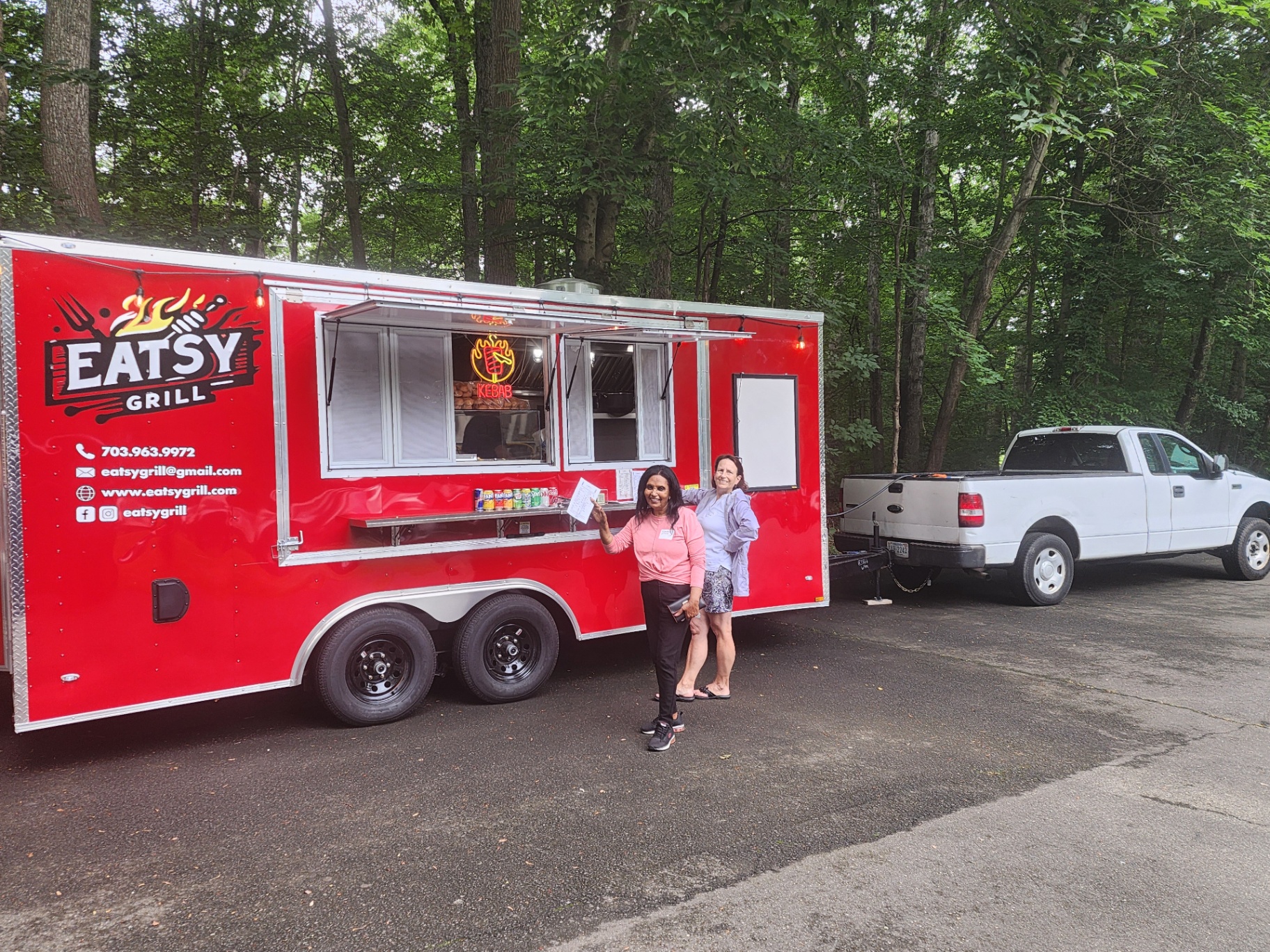 Eatsy Grill red food trailer during daytime service